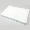 White, plush non-slip bath mat for hotels and motels, featuring a classic border design.