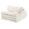 A stack of four neatly folded, large white bath towels with a blend of cotton and polyester, highlighting their durability and professional appearance.