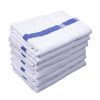 Stack of premium white platinum pool towels for luxury hotels
