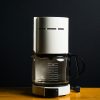 Durable in-room coffee maker for hotel and motel guest use