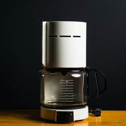 Durable in-room coffee maker for hotel and motel guest use
