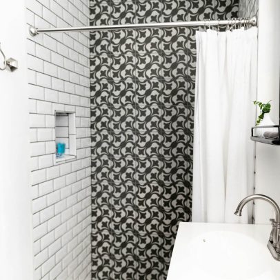 Adjustable chrome shower curtain rod for hotel bathroom installations