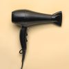 Black handheld hair dryer with ergonomic design