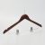 Angled mahogany wooden women’s hanger with clips and ball hook