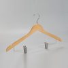 Angled view of natural wood women’s hanger with open hook and clips