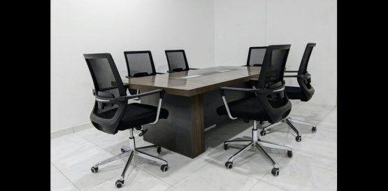 Ergonomic mesh Conference chair with adjustable armrests.