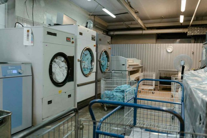 Linens in a hotel laundry area in bulk quantity